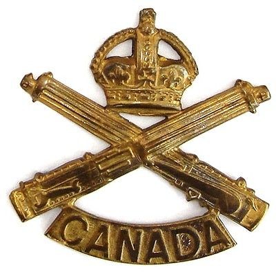 WW1 THE MACHINE GUN CANADA CAP BADGE BRASS METAL